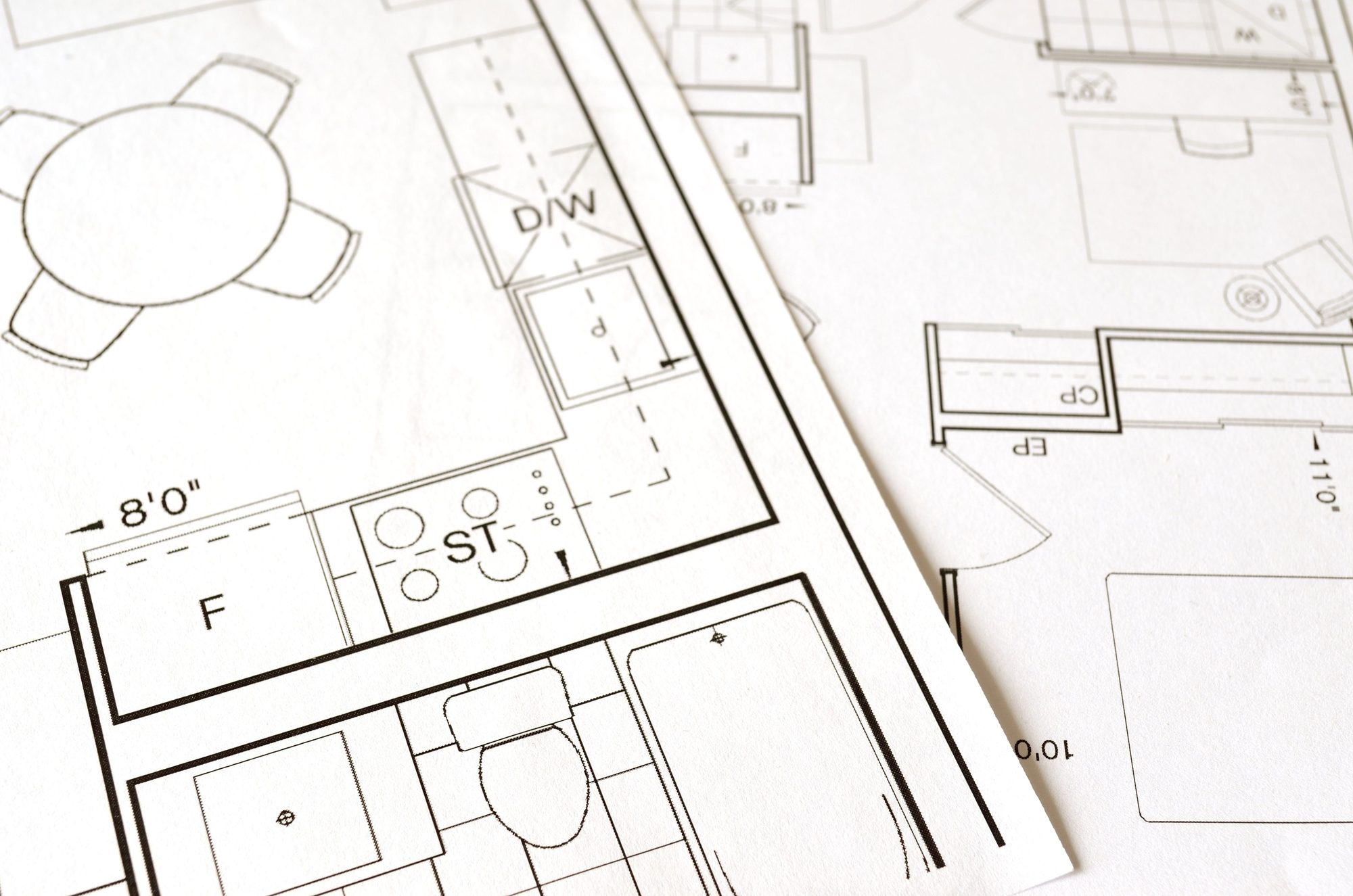 Close-up of a small-unit floor plan showing kitchen, bath, and dining layout